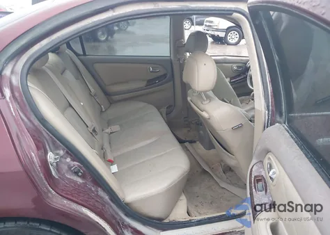 2001 Infiniti I30 Luxury z USA, uszkodzony, nr VIN JNKCA31A11T037057